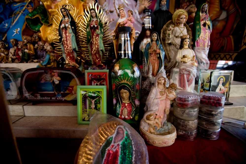 A virgin in a bottle sits for sale outside a church in Tijuana, Mexico.